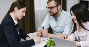 Financial advisor discussing SALT deduction and PTE tax planning strategies with clients