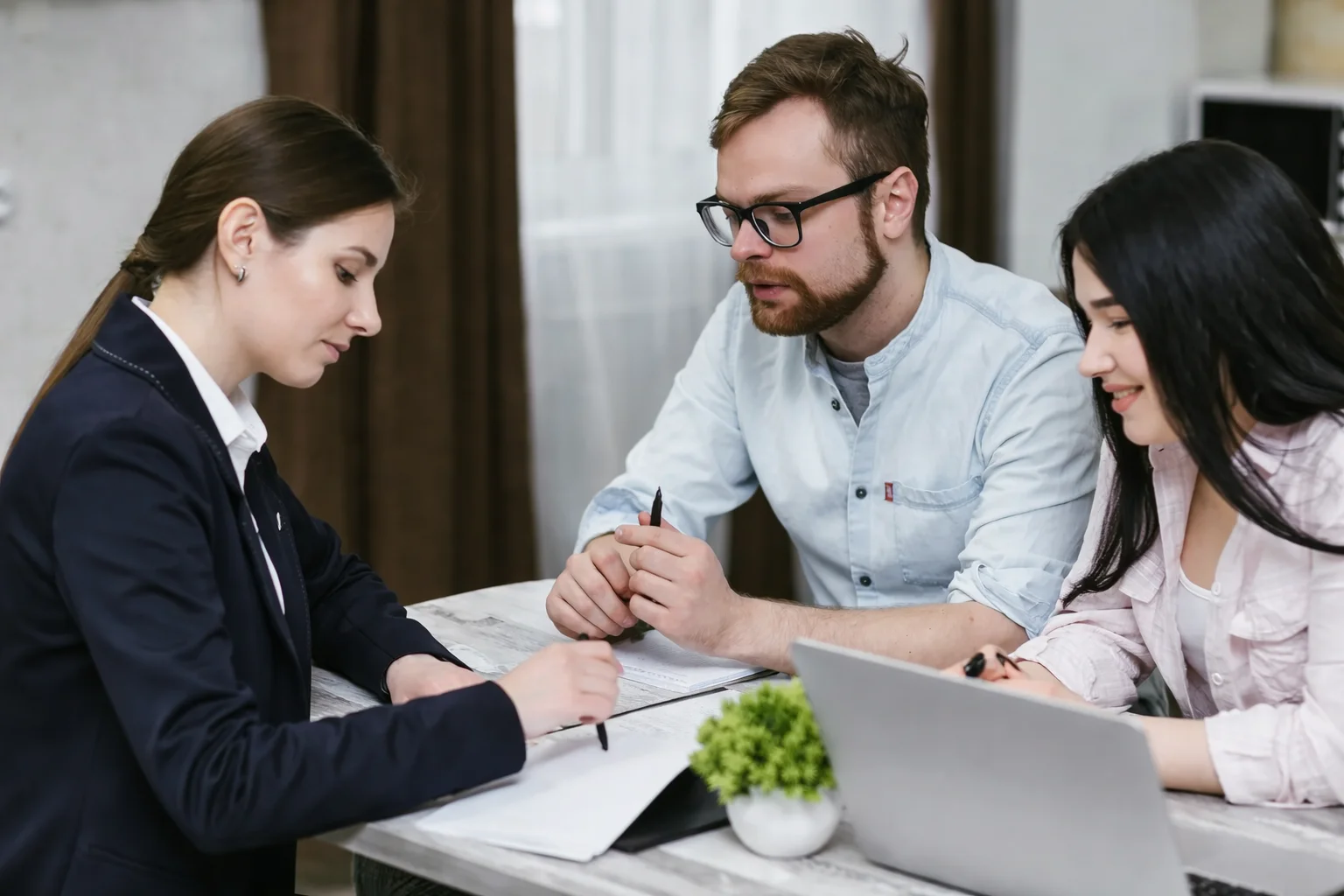 Financial advisor discussing SALT deduction and PTE tax planning strategies with clients