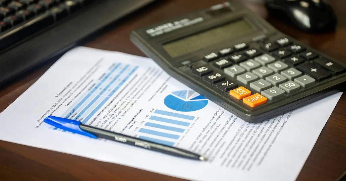 Depreciation recapture tax planning with financial documents and calculator